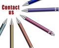 Set of pens directed to note contact us Royalty Free Stock Photo