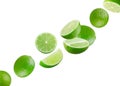 Set of perfectly retouched limes, whole and halves isolated on white background. Limes fly through space. Excellent retouching and Royalty Free Stock Photo
