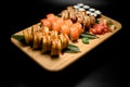 Set of philadelphia sushi rolls with eel, salmon and tuna and maki Royalty Free Stock Photo