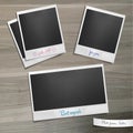 Set of photo frames with caption on a wooden table Royalty Free Stock Photo