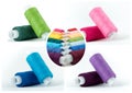 A set of photos of the coils of multi-colored sewing thread.