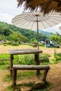 Set of picnic table with white umbrella