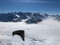 Winter Austria Snow Ice White Cold Lift Ski Snowboard Mountain Sun Clouds Blue Sky Red Plastic Red Fence Metal Shadow Closeup