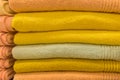 Set pile stacked yellow bright color fabric towels object hygiene bathroom concept, close up Royalty Free Stock Photo