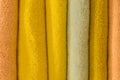 Set pile stacked yellow bright color fabric towels object hygiene bathroom concept, close up Royalty Free Stock Photo