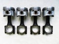 A set of pistons and rods for automobile engine on a background Royalty Free Stock Photo