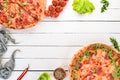 Set pizza. Italian cuisine. Top view. On a wooden background. Royalty Free Stock Photo