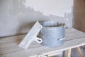 Set of plaster trowel tool, spatula and bucket. Royalty Free Stock Photo