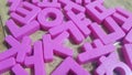 Set of plastic alphabet letters placed on a wooden floor Royalty Free Stock Photo