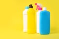 Set of plastic bottles on a yellow background Royalty Free Stock Photo
