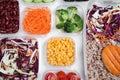 Set of plastic containers with fresh food on white wooden table, flat lay Royalty Free Stock Photo