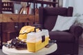 Set of plastic toy tools and yellow toolbox on a table Royalty Free Stock Photo