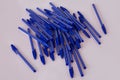 Blue plastic pens isolated on white Royalty Free Stock Photo