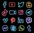 Set of popular logos in neon design: Facebook, Instagram, Twitter, Youtube, WhatsApp, and others