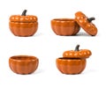 A set of porcelain pots in the shape of a pumpkin isolated on a white background Royalty Free Stock Photo