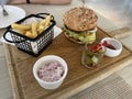 Set of pork burger and frensh fries