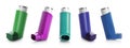 Set with portable asthma inhalers on background. Banner design
