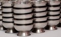 A SET OF POTS, STAINLESS STEEL Royalty Free Stock Photo