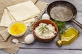 Set of products for cooking hot snack. Pita bread, cottage cheese, eggs, greens, vegetable oil Royalty Free Stock Photo