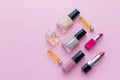 Set of professional decorative cosmetics, makeup tools and accessory on pink background. beauty, fashion and