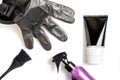 Set of professional hairdresser tools for coloring hair - bleach brush, bowl, spray, gloves and tube of coloring stuff,