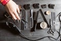 Set of professional hairdresser tools on grey background. Wooden table in barbershop. Working tool of barber master Royalty Free Stock Photo