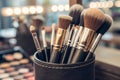 Set of professional makeup brushes in holder, closeup and a shallow depth of field - generated by ai Royalty Free Stock Photo