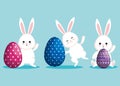 Set rabbits with easter eggs figures decoration