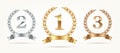 Set of rank emblems - gold, silver, bronze. First place, second place and third place signs with laurel wreath and ribbon. Royalty Free Stock Photo