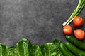 Set of Raw organic food, vegetables with fresh ingredients for healthily cooking on black background, top view, banner. Vegan or