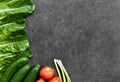 Set of Raw organic food, vegetables with fresh ingredients for healthily cooking on black  background, top view, banner. Vegan or Royalty Free Stock Photo