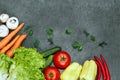 Set of Raw organic vegetables with fresh ingredients for healthily cooking on black background, top view, banner.