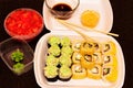A set of ready-made sushi and rolls and ingredients for them Royalty Free Stock Photo