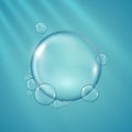 Set of realistic transparent water bubbles on abstract blue background Royalty Free Stock Photo