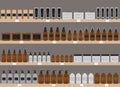 Set of recyclable bottles, jars and tubes with organic cosmetics, skin care products on shelves in supermarket. Set of cosmetic Royalty Free Stock Photo