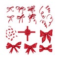 Set of red bows, ribbons and festive tinsel. Royalty Free Stock Photo