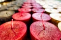 set of red candles with white wick in a row Royalty Free Stock Photo