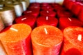 set of red candles with white wick in a row Royalty Free Stock Photo