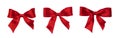 Set of red gift satin ribbon bows on white background Royalty Free Stock Photo