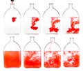 Set of red ink solutions in glass flask isolated Royalty Free Stock Photo