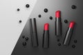 Set of red lipsticks in black tubes with black perls