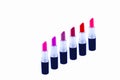 Set of red lipsticks isolated on white Royalty Free Stock Photo