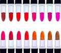 Set of red lipsticks isolated on white reflective Royalty Free Stock Photo