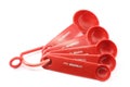 Set of red measuring spoons