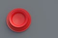 Set of red plates on gray background. Top view. Copy space Royalty Free Stock Photo