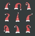 Set of red santa claus hats. Elves caps collection. Vector illustration in cartoon style. Royalty Free Stock Photo