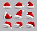 Collection of Red Santa Claus Hats isolated on gray background. Set. Vector Realistic Illustration. Royalty Free Stock Photo