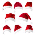 Set of red Santa Claus hats isolated on white background Royalty Free Stock Photo