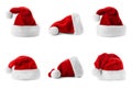 Set of red Santa Claus hats on white Royalty Free Stock Photo