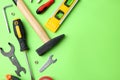 Set of repair tools on light green background,  lay. Space for text Royalty Free Stock Photo